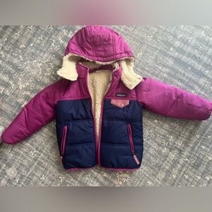 BRAND NEW and never worn, but tags are removed.